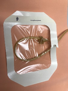 latex urinary catheter attached to simulated skin with tegaderm