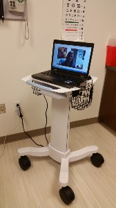 telemedicine car with a laptop