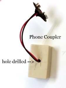 phone coupler with drilled hole through the plastic cover to give room for the wires on the snap connector