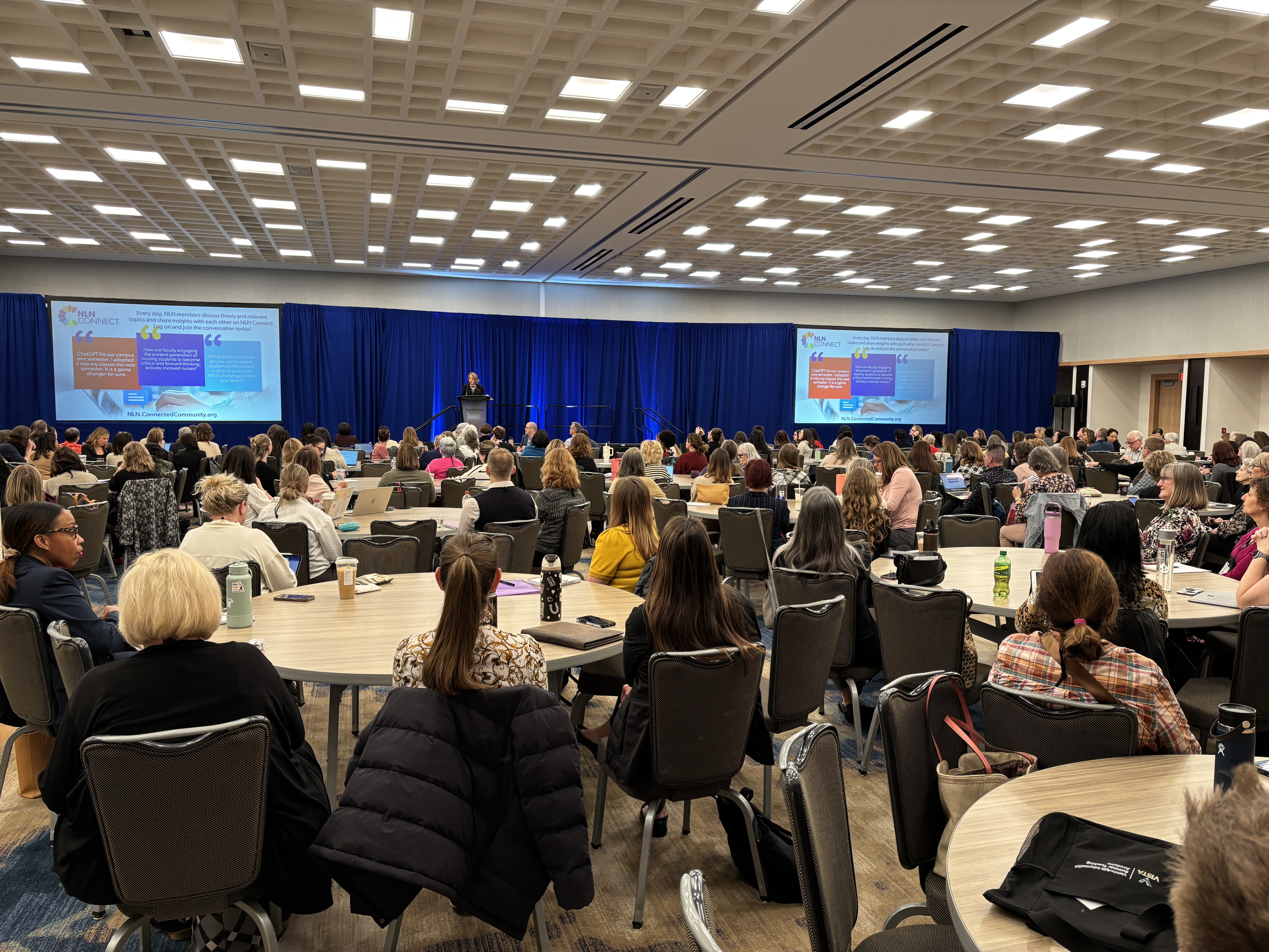 NERC 2025 Plenary View of a large room filled with conference attendees listening to a speaker